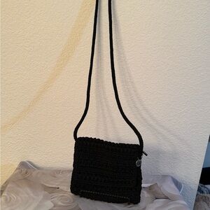 - The Sak Women's Black Crochet Crossbody Bag with Zip Closure